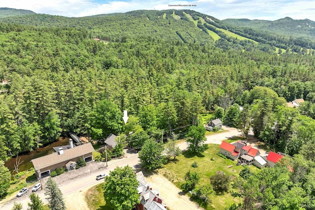679 Kearsarge Rd, Conway, NH 03860 - aerial view of a forest and mountains