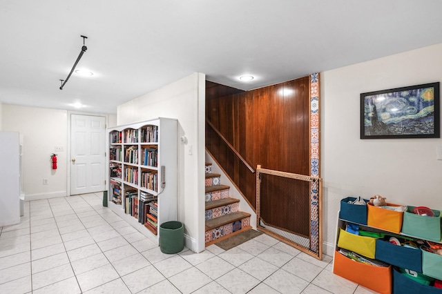 4 Sauer Ter, Durham, NH 03824 - basement with tile patterned floors, freestanding refrigerator, and stairs