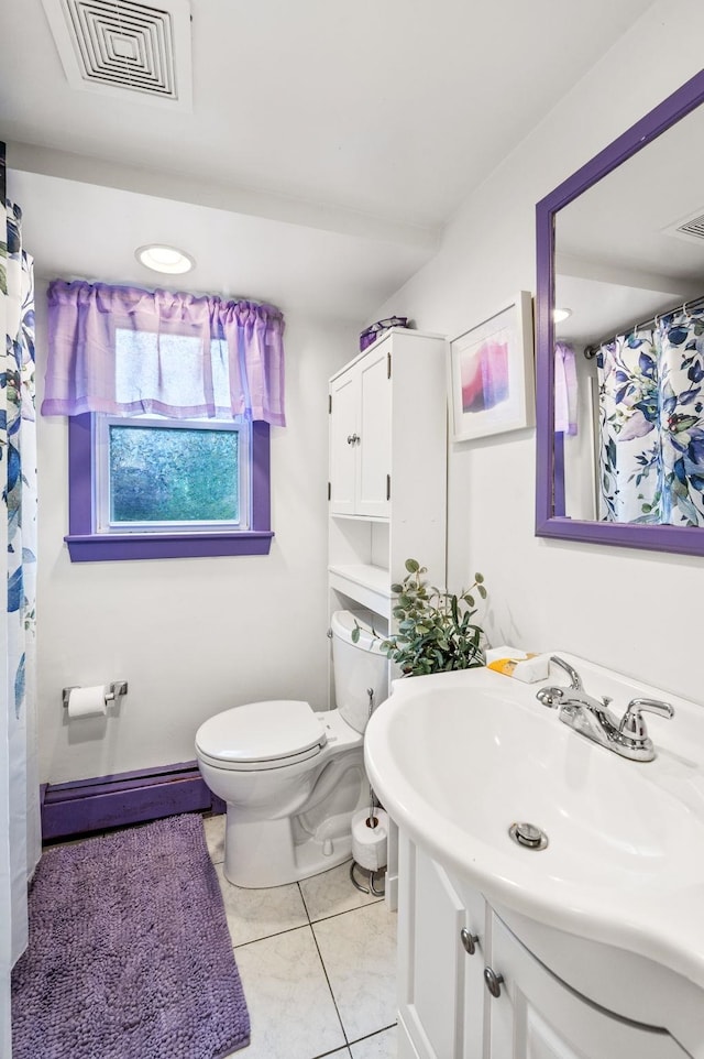 4 Sauer Ter, Durham, NH 03824 - full bath featuring baseboard heating, vanity, tile patterned floors, and curtained shower