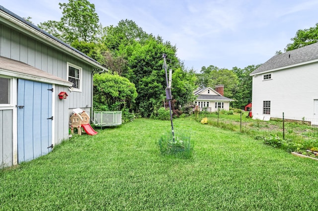 4 Sauer Ter, Durham, NH 03824 - view of green lawn with view of wooded area and an outbuilding