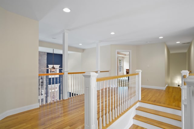 4 Chablis Ct, Bedford, NH 03110 - hall featuring wood finished floors, an upstairs landing, and recessed lighting