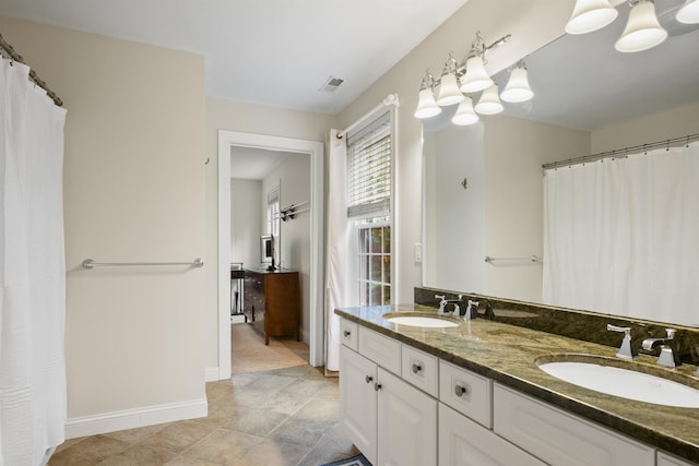4 Chablis Ct, Bedford, NH 03110 - full bath featuring double vanity, tile patterned flooring, and a shower with curtain