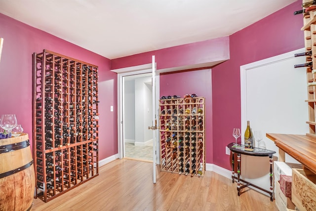4 Chablis Ct, Bedford, NH 03110 - wine room featuring wood finished floors and baseboards