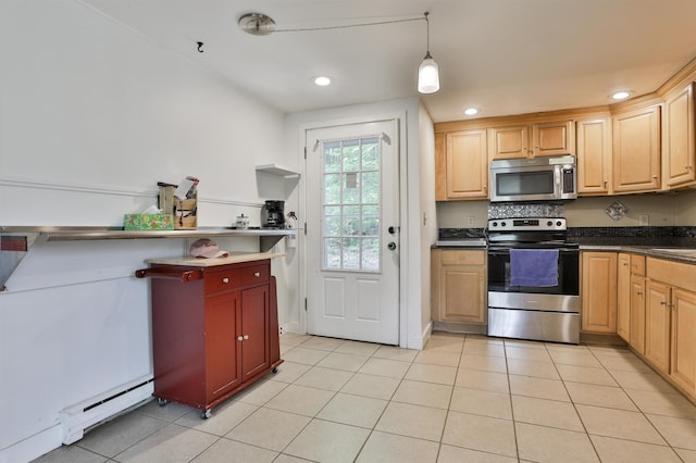 37 Eastside Ln Unit 1, Francestown, NH 03043 - kitchen with appliances with stainless steel finishes, baseboard heating, dark countertops, light tile patterned floors, and recessed lighting