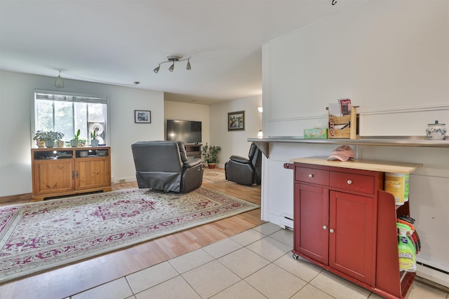 37 Eastside Ln Unit 1, Francestown, NH 03043 - living room with a baseboard radiator and light tile patterned flooring
