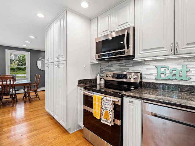 44 Mcquade Brook Rd, Bedford, NH 03110 - kitchen featuring stainless steel appliances, white cabinets, backsplash, light wood-style flooring, and recessed lighting
