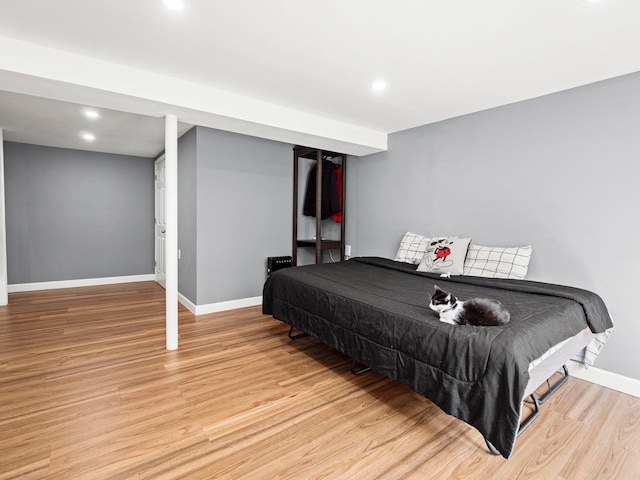 44 Mcquade Brook Rd, Bedford, NH 03110 - bedroom featuring wood finished floors and recessed lighting