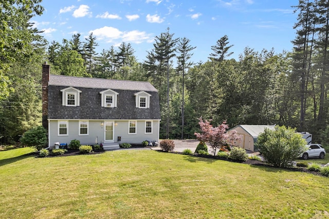 44 Mcquade Brook Rd, Bedford, NH 03110 - dutch colonial with a gambrel roof, a chimney, a front lawn, and a shingled roof