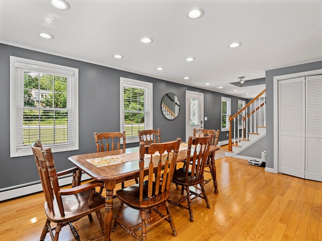 44 Mcquade Brook Rd, Bedford, NH 03110 - dining room featuring light wood-style floors, recessed lighting, plenty of natural light, crown molding, and stairs