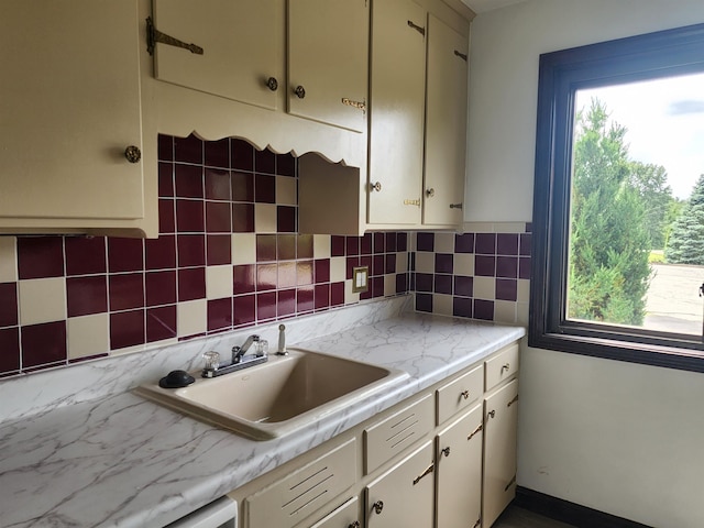 33 Pendleton Ln, Londonderry, NH 03053 - kitchen featuring light countertops and decorative backsplash