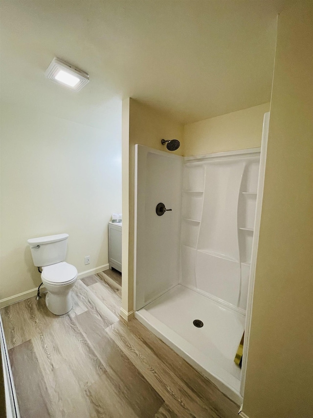 17 Arch St, Laconia, NH 03246 - bathroom with a shower and wood finished floors