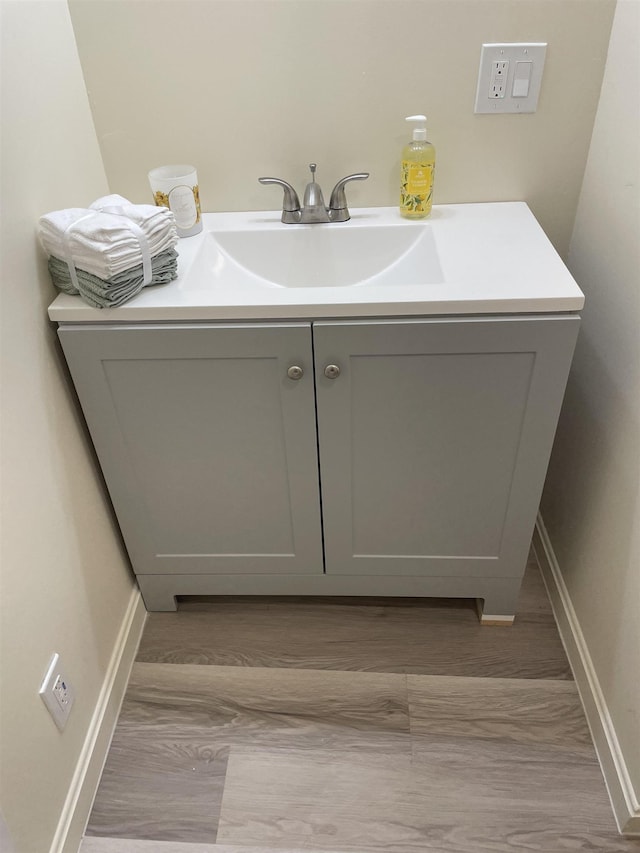 17 Arch St, Laconia, NH 03246 - laundry room with a sink and light wood finished floors