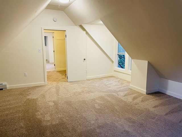 17 Arch St, Laconia, NH 03246 - additional living space with light carpet and vaulted ceiling