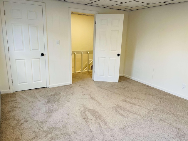 17 Arch St, Laconia, NH 03246 - unfurnished bedroom with carpet floors and a drop ceiling