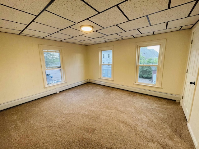 17 Arch St, Laconia, NH 03246 - carpeted empty room with plenty of natural light and a paneled ceiling