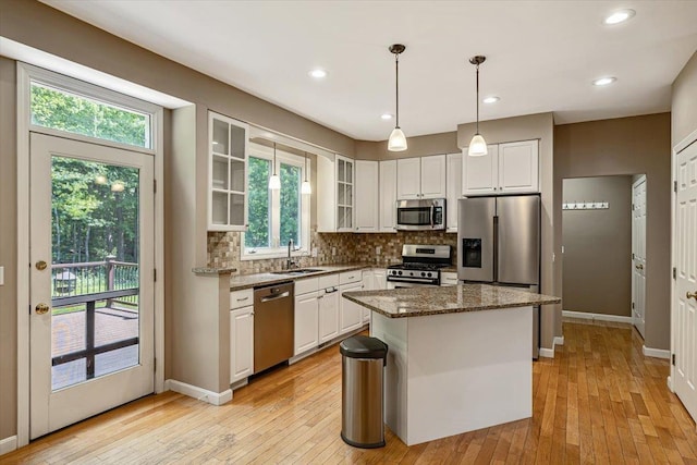 473 Brennan Woods Dr, Williston, VT 05495 - kitchen with appliances with stainless steel finishes, white cabinets, plenty of natural light, and recessed lighting