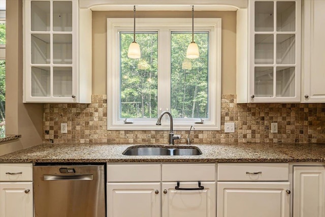 473 Brennan Woods Dr, Williston, VT 05495 - kitchen with dishwasher, white cabinetry, glass insert cabinets, and hanging light fixtures