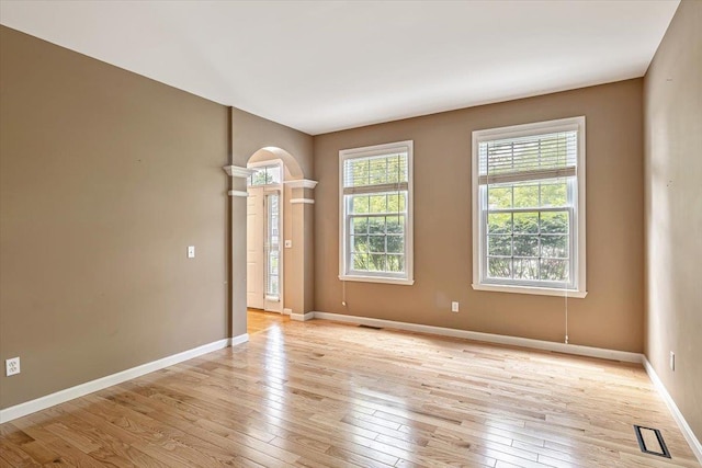473 Brennan Woods Dr, Williston, VT 05495 - unfurnished room featuring light wood finished floors and arched walkways