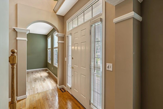473 Brennan Woods Dr, Williston, VT 05495 - entryway with arched walkways and light wood-style flooring