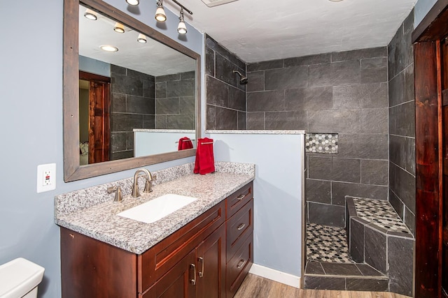 33 Hillside Rd, Kingston, NH 03848 - full bath featuring walk in shower, vanity, and wood finished floors