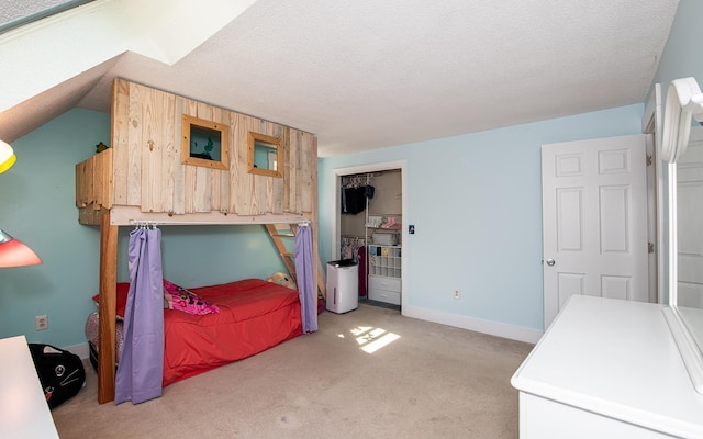 33 Hillside Rd, Kingston, NH 03848 - bedroom with light colored carpet, a closet, and a textured ceiling