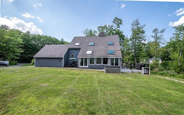 33 Hillside Rd, Kingston, NH 03848 - rear view of house featuring roof with shingles, a lawn, a chimney, and a deck