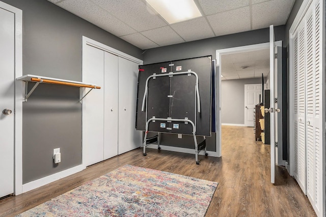 37 Thornhill Rd, Stratham, NH 03885 - bedroom featuring a drop ceiling, wood finished floors, and a closet
