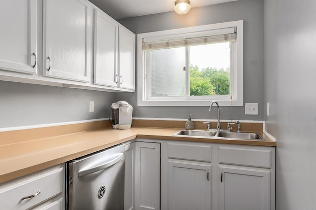 37 Thornhill Rd, Stratham, NH 03885 - kitchen featuring stainless steel dishwasher, light countertops, and white cabinetry