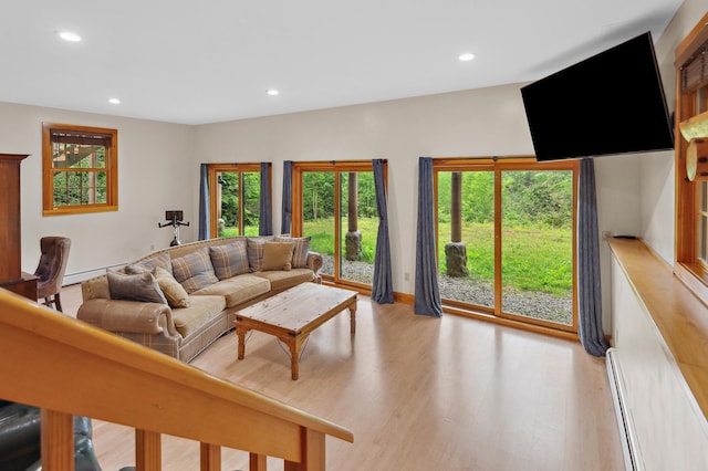 1 Peak Vista Ln, Madison, NH 03849 - living room with recessed lighting, light wood-style flooring, and a baseboard heating unit