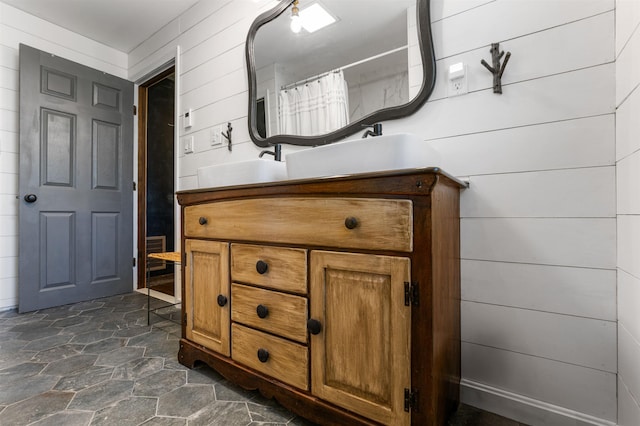 174 E Colebrook Rd, Colebrook, NH 03576 - bathroom with vanity and stone finish flooring