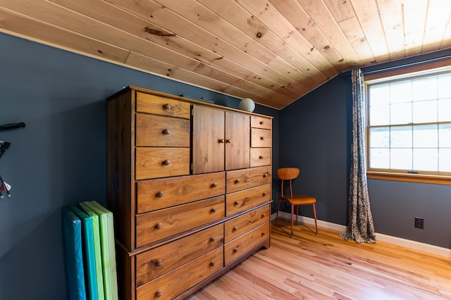 174 E Colebrook Rd, Colebrook, NH 03576 - bedroom featuring vaulted ceiling, light wood-type flooring, and wood ceiling