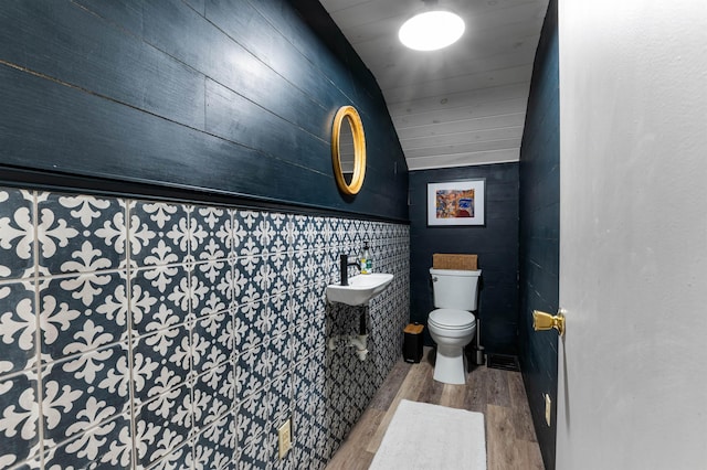 174 E Colebrook Rd, Colebrook, NH 03576 - half bathroom with a sink and wood finished floors