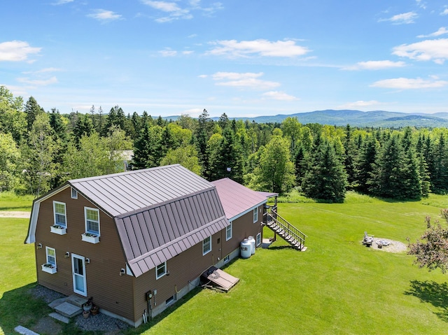 174 E Colebrook Rd, Colebrook, NH 03576 - view of subject property with a forest and a mountainous background