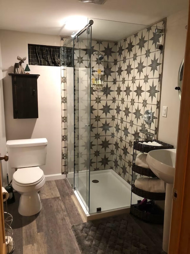 174 E Colebrook Rd, Colebrook, NH 03576 - bathroom with a stall shower and wood finished floors