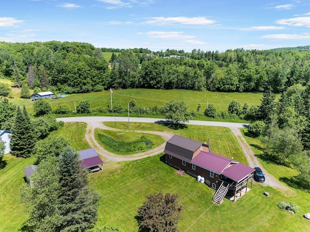174 E Colebrook Rd, Colebrook, NH 03576 - aerial view of property and surrounding area with a heavily wooded area