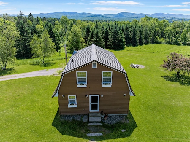 174 E Colebrook Rd, Colebrook, NH 03576 - view from above of property with a mountainous background and a forest