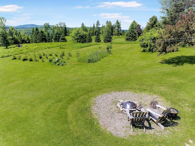 174 E Colebrook Rd, Colebrook, NH 03576 - view of yard with a fire pit and a mountain view