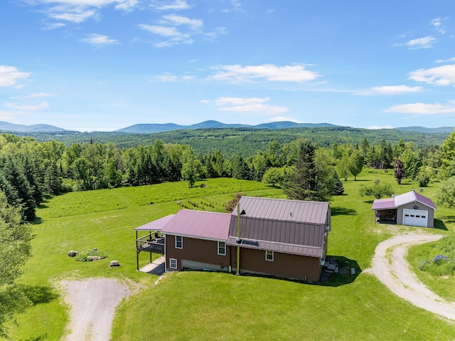 174 E Colebrook Rd, Colebrook, NH 03576 - view of subject property with a heavily wooded area and a mountainous background