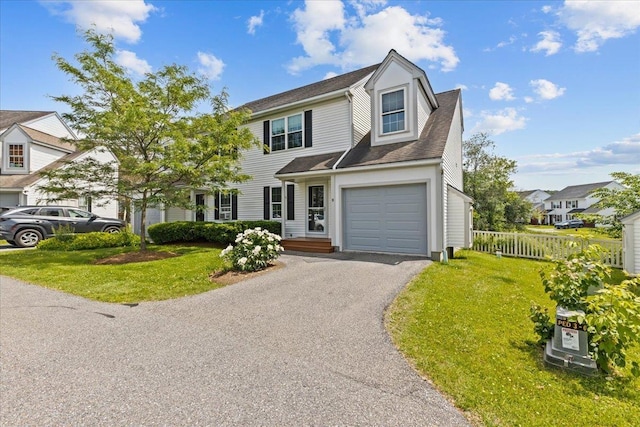 8 Kristen Ct, Williston, VT 05495 - view of front facade with a garage, asphalt driveway, and a shingled roof