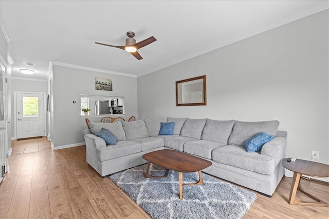 8 Kristen Ct, Williston, VT 05495 - living area featuring crown molding, light wood-style flooring, and a ceiling fan