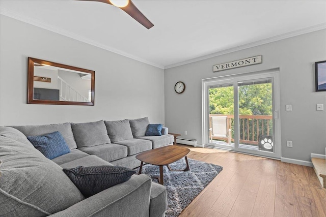 8 Kristen Ct, Williston, VT 05495 - living area with baseboard heating, crown molding, wood finished floors, and a ceiling fan