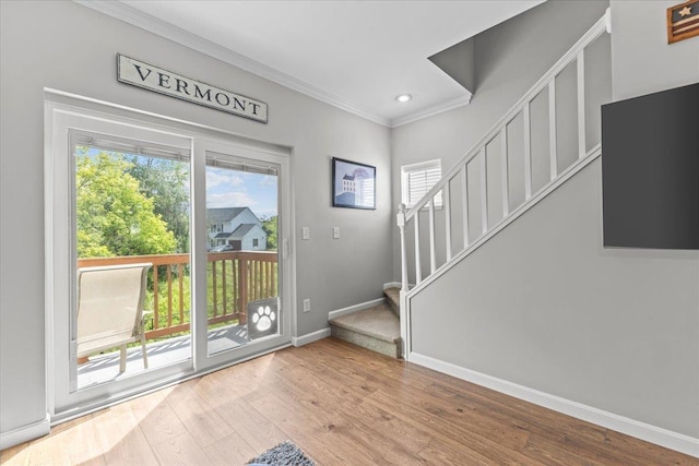 8 Kristen Ct, Williston, VT 05495 - doorway to outside with crown molding, stairs, healthy amount of natural light, recessed lighting, and wood finished floors
