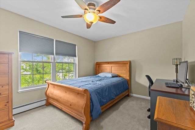 8 Kristen Ct, Williston, VT 05495 - bedroom with a baseboard radiator, light carpet, a desk, and a ceiling fan