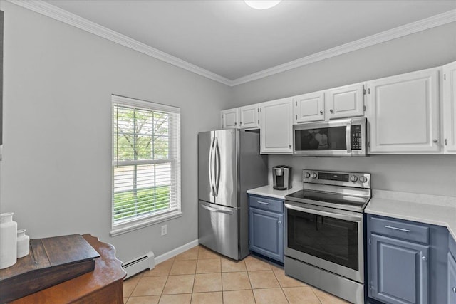 8 Kristen Ct, Williston, VT 05495 - kitchen with stainless steel appliances, baseboard heating, blue cabinets, light countertops, and white cabinetry