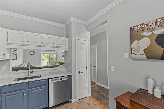8 Kristen Ct, Williston, VT 05495 - kitchen with stainless steel dishwasher, blue cabinetry, white cabinets, light countertops, and crown molding
