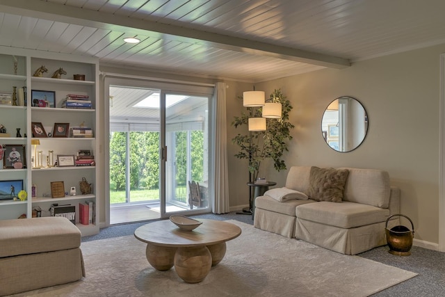 38C Stonehouse Ln, Keene, NH 03431 - living room featuring carpet floors and a wood ceiling with exposed beams