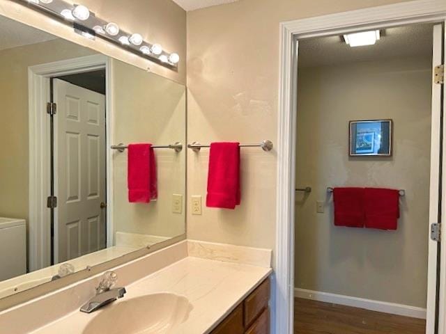 38C Stonehouse Ln, Keene, NH 03431 - bathroom featuring vanity and wood finished floors
