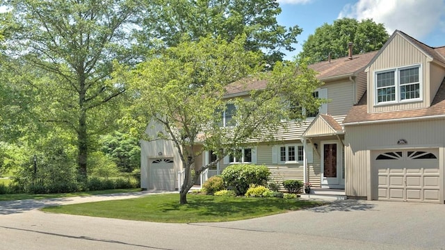 38C Stonehouse Ln, Keene, NH 03431 - view of front of property with driveway, a front yard, and an attached garage