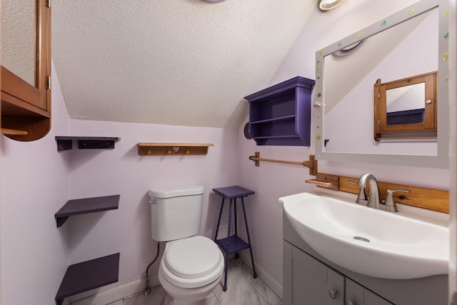 85 Lakeview Ave, Bristol, NH 03222 - half bath with vanity, vaulted ceiling, and a textured ceiling