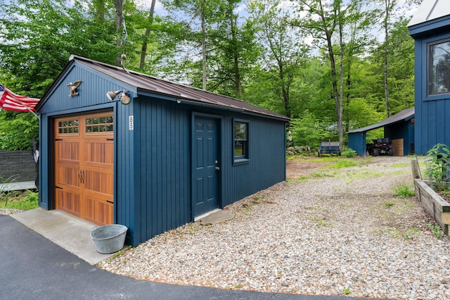 85 Lakeview Ave, Bristol, NH 03222 - detached garage featuring asphalt driveway